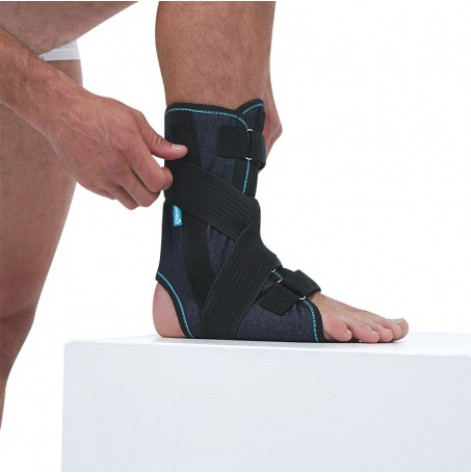 Bandage (orthosis) on the ankle joint with fixator (black) r.4